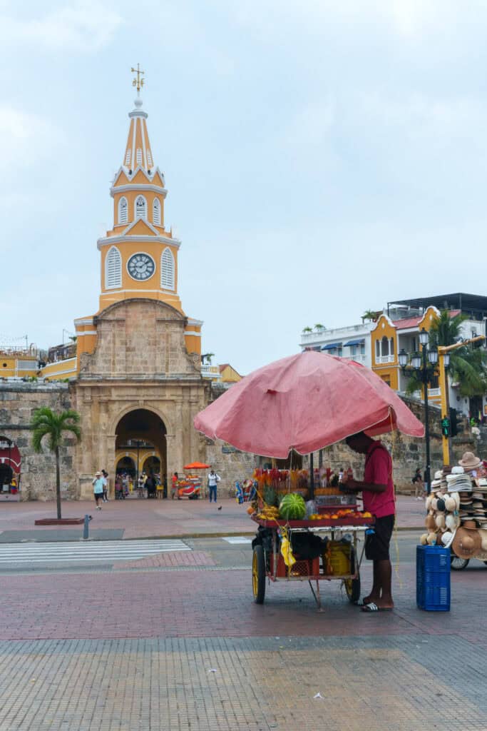 yellow church at cartagena with a mobil juice shop on the first plan