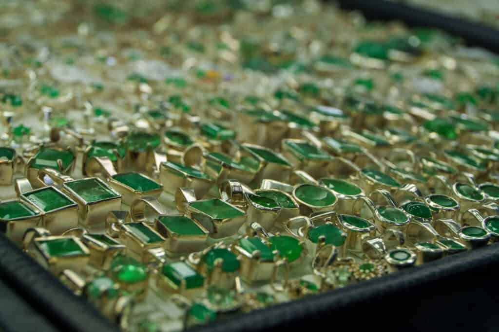 CLose up of jewlery with Muzo emerald as the main piece of it