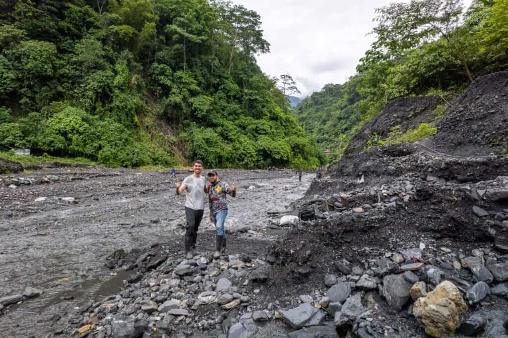 Me (horizon Hugo) and my guide (Juan) at the river where many miners work here to find emeralds