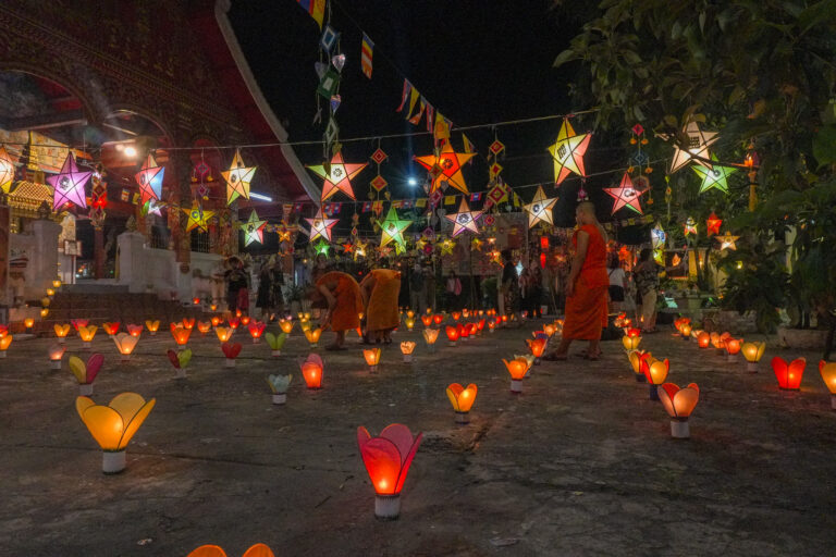 Temple illuminated by lanterns on the grounds and attached everywhere during the Boun Ork Phansa celebration in Luang PRabang, Laos.