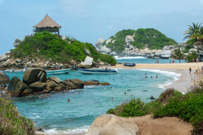 Cabo San Juan bay with the beach and the house on the hill in the background.