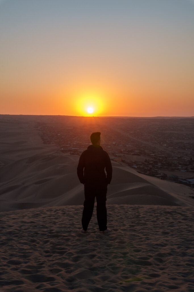 Sunset on the top of the dunes next to Huacachina