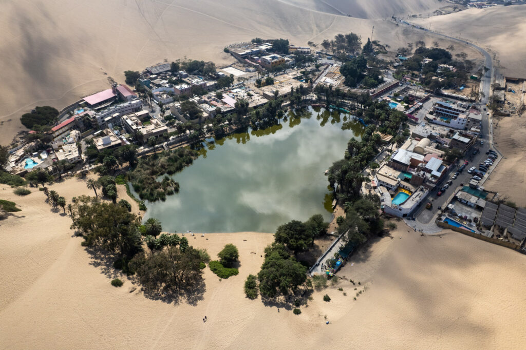 Lagoon of Huacachina reflecting the clouds