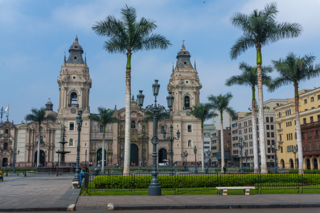 Main square with the basilic Cathedral of Lima in the background
