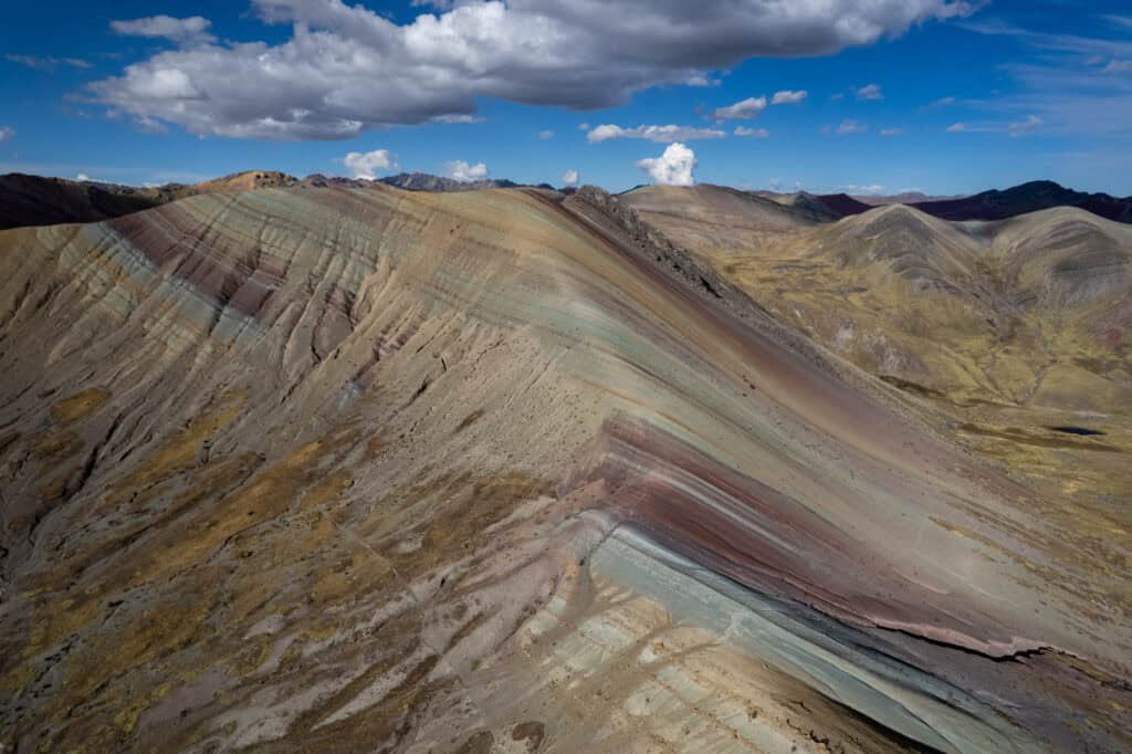 Aerial view of the Polccoyo rainbow mountain in Peru