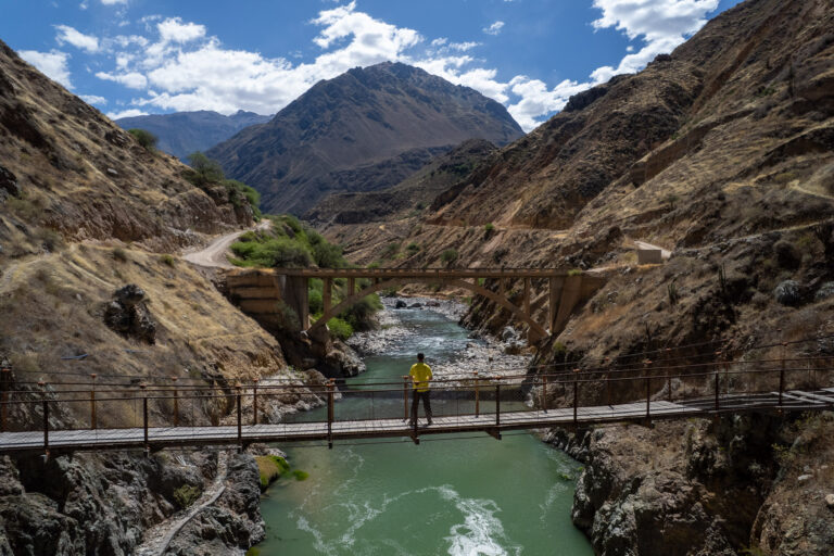 Aerial view of me (horizon hugo) standing on the bridge down the colca canyon near llahuar Village, Peru