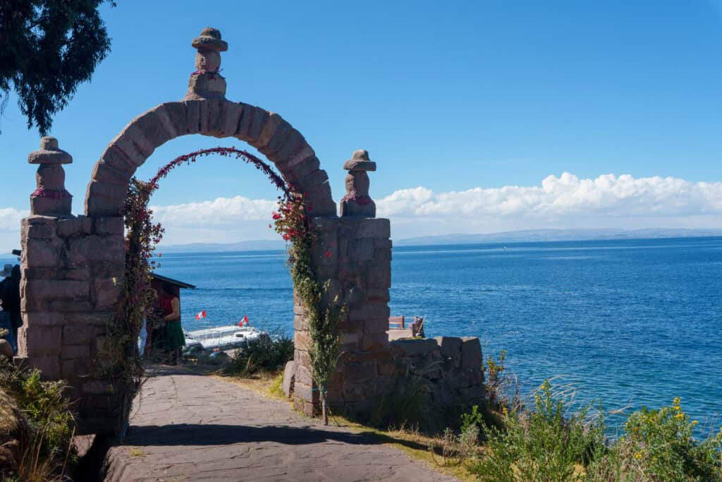 Arc rock door at Taquile islnd on lake titicaca. this door symbolyse the entrance into a new community on the island