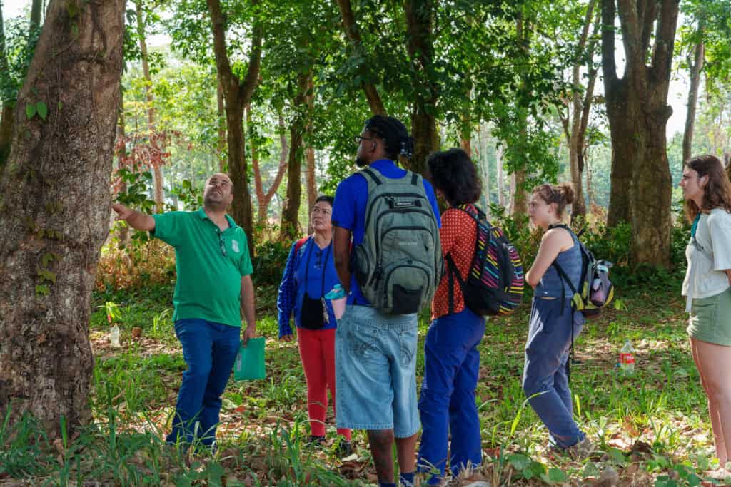 Volunteers listening to a local professor at the university at Riberalta teaching about the trees from the amazon rainforest
