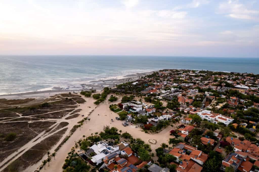 Aerial view of the city of Jericoacoara, Brazil. roads are made of sands, the city is small and next to the beach with a beautiful sea.