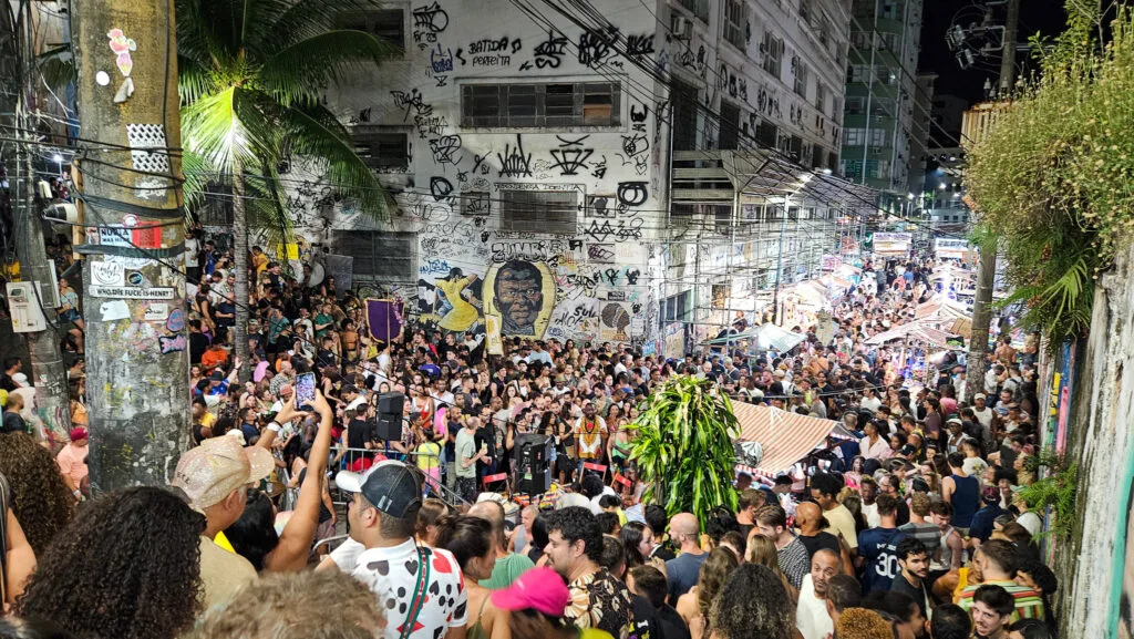 Pedra do sal on a monday night in the center of Rio de Janeiro, Brazil. there is a huge crowded listening to a samba group in the middle.