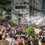 Pedra do sal on a monday night in the center of Rio de Janeiro, Brazil. there is a huge crowded listening to a samba group in the middle.