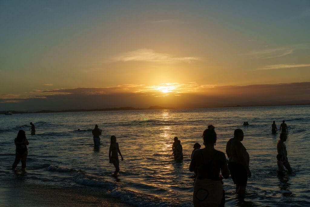 Sunset at Barar Grande main beach. people enjoy the last ray of the sun.