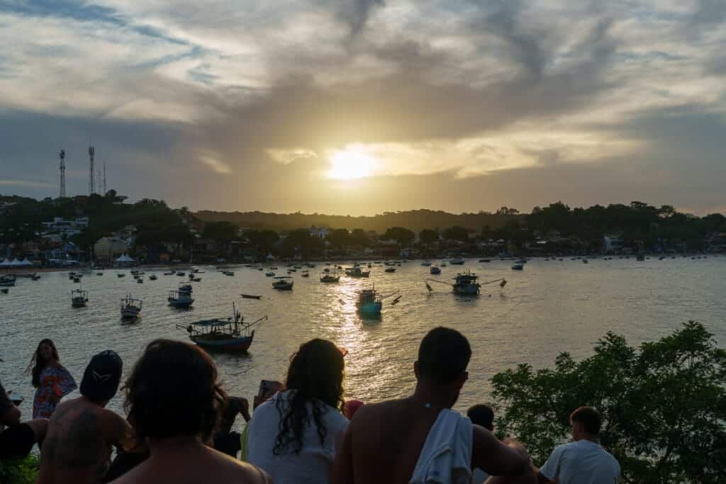 Sunset on the hill in Itacaré, Brazil. People come here every evenning to watch the sunset.