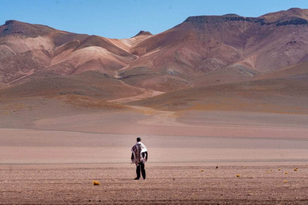 me ( HorizonHugo), in front of mountains that are part of the Desert of Salavador Dali in the South of Bolivia. it's a desert you can visit in 4x4 from Uyuni.