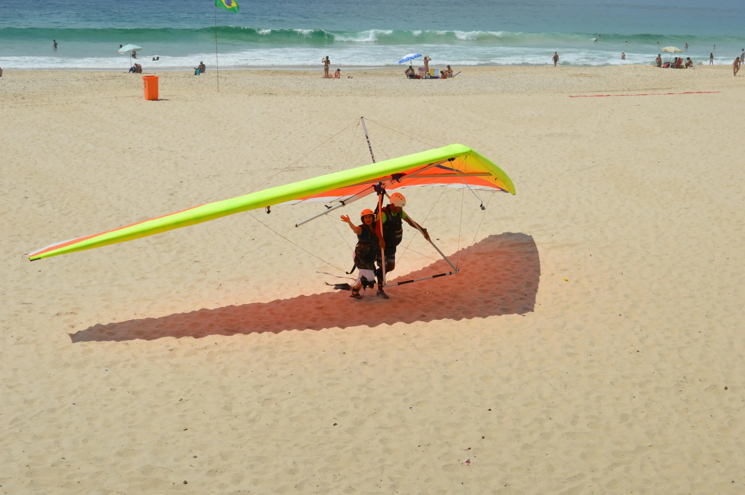 Handgliding landing on the beach sao conrado in Rio de Janeiro, Brazil.