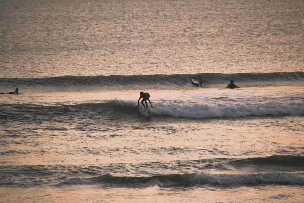 Child surfing at Canggu, in Bali, Indonesia.