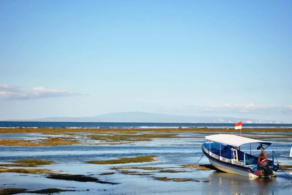 boat attached near to the beach in Sanur, a fisherman village in Bali Indonesia.