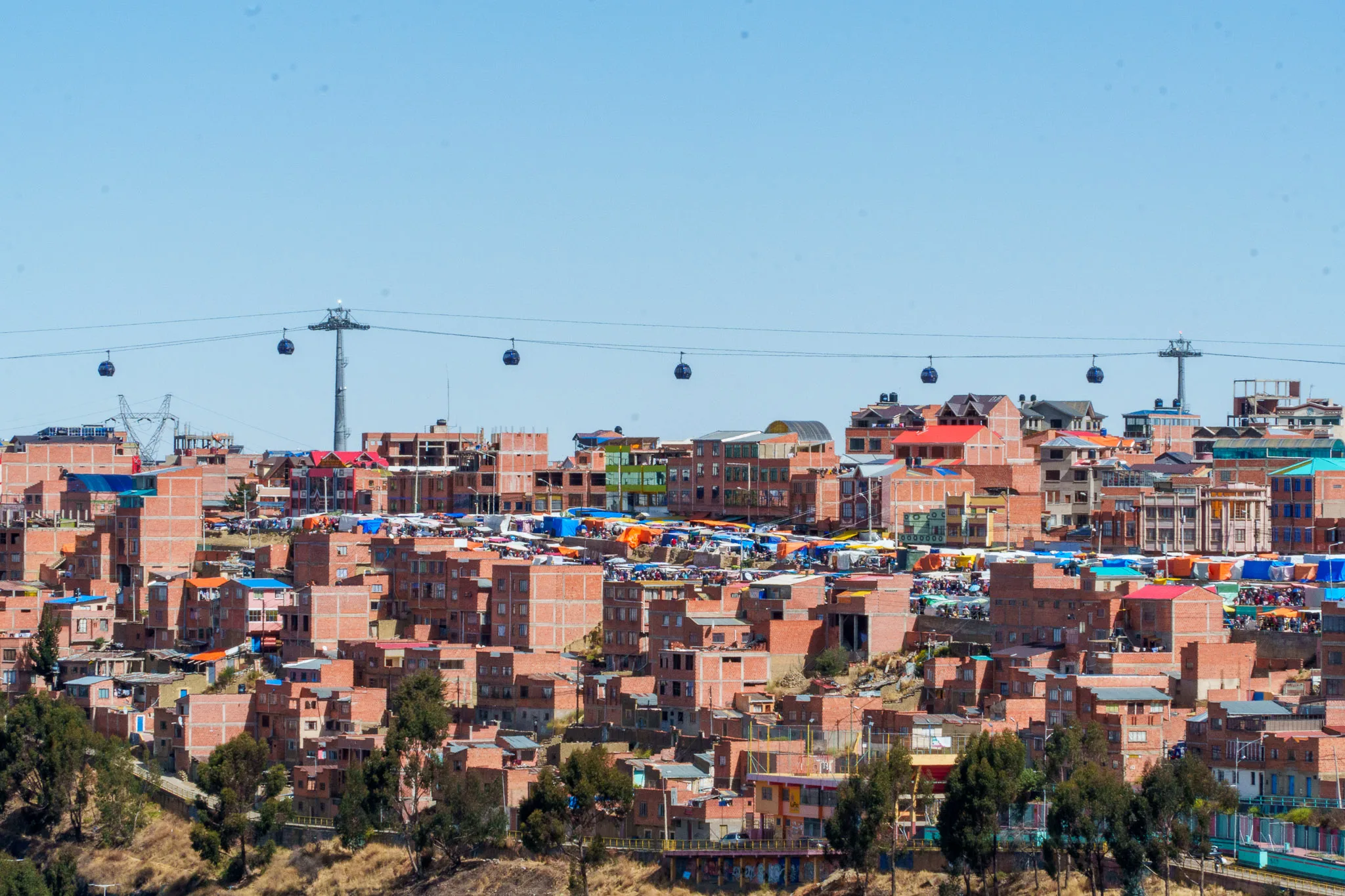 Teleferico, or cable car, in El Alto, La Paz, Bolivia. it's passing above the houses.