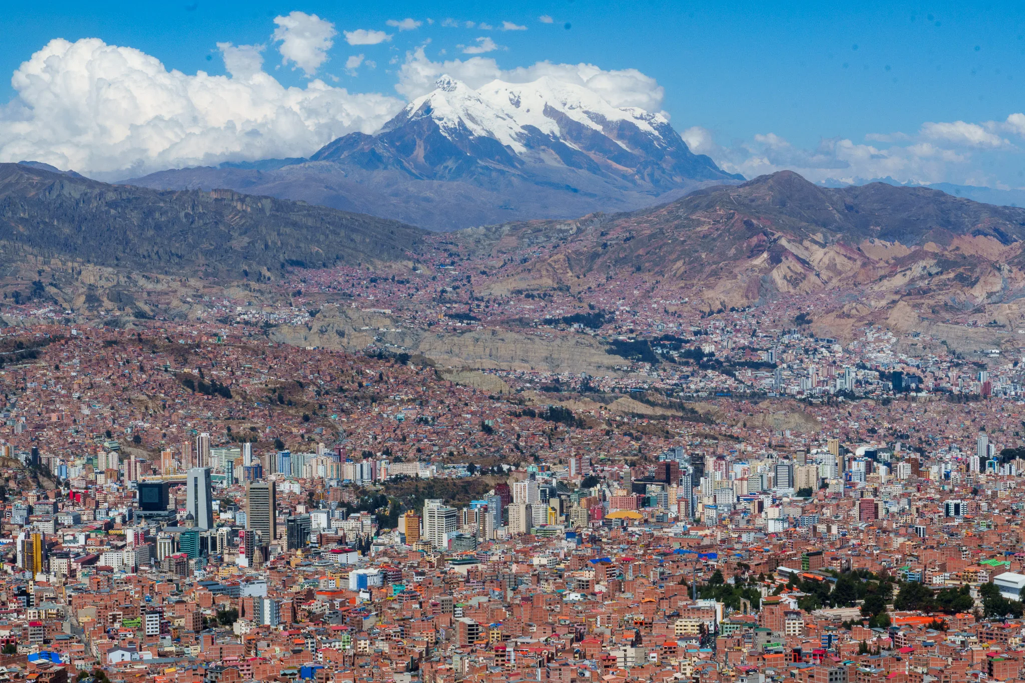 Wide view of La Paz with the Illimani mountain in the background.
