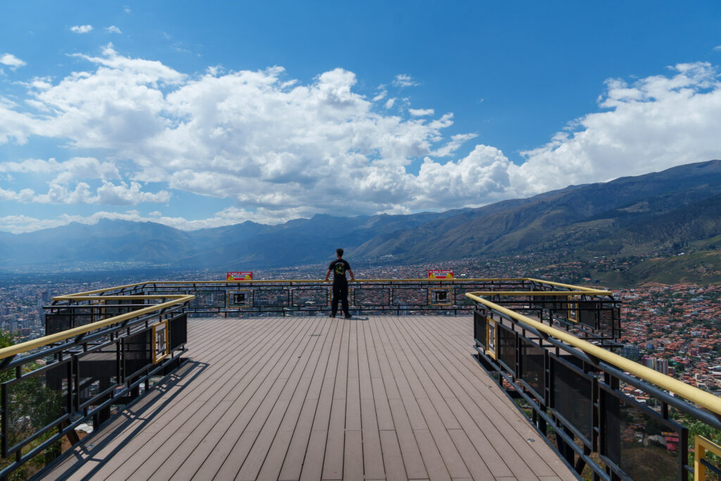 Me ( Horizon Hugo) standing at the Cristo Viewpoint in Cochabamba, looking at the city.