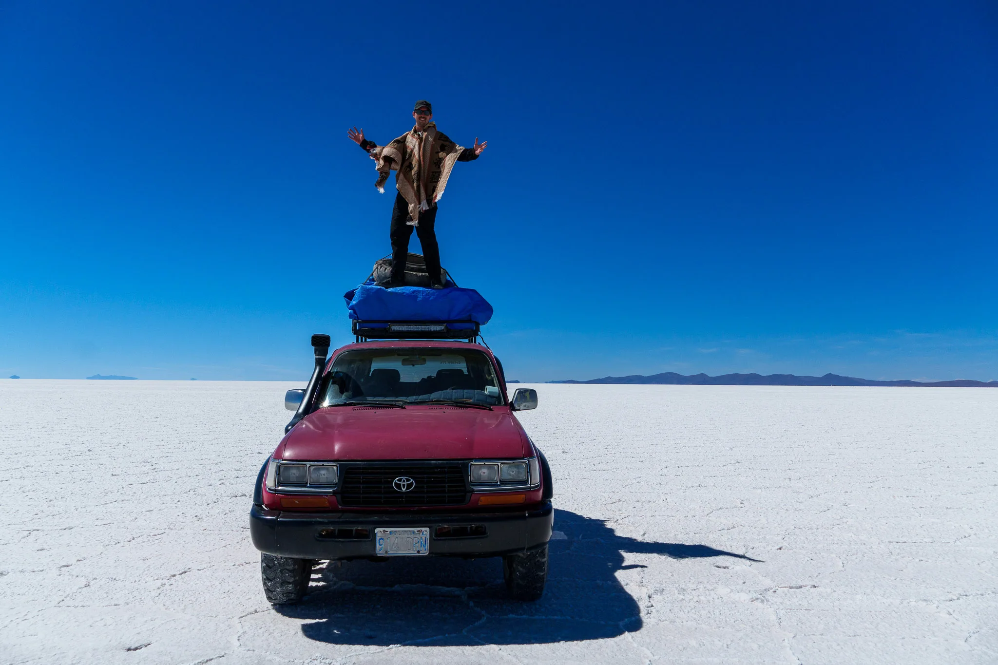 Me (HorizonHugo) standing on the 4x4 at the salt flats in Uyuni, Bolivia.