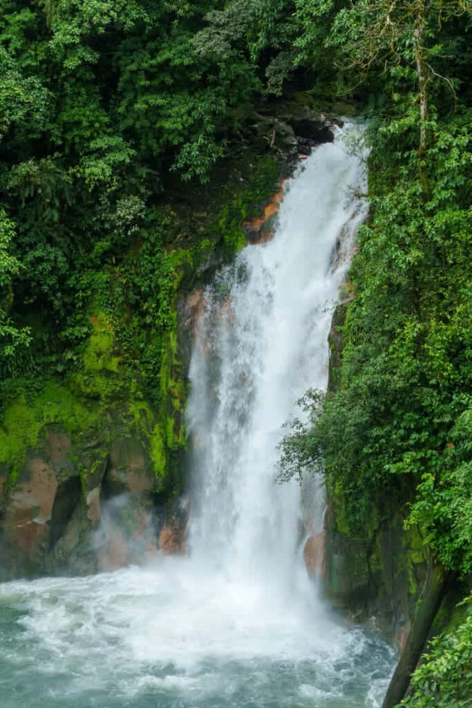 Waterfall of the celeste river inside the volcan tenorio national park.