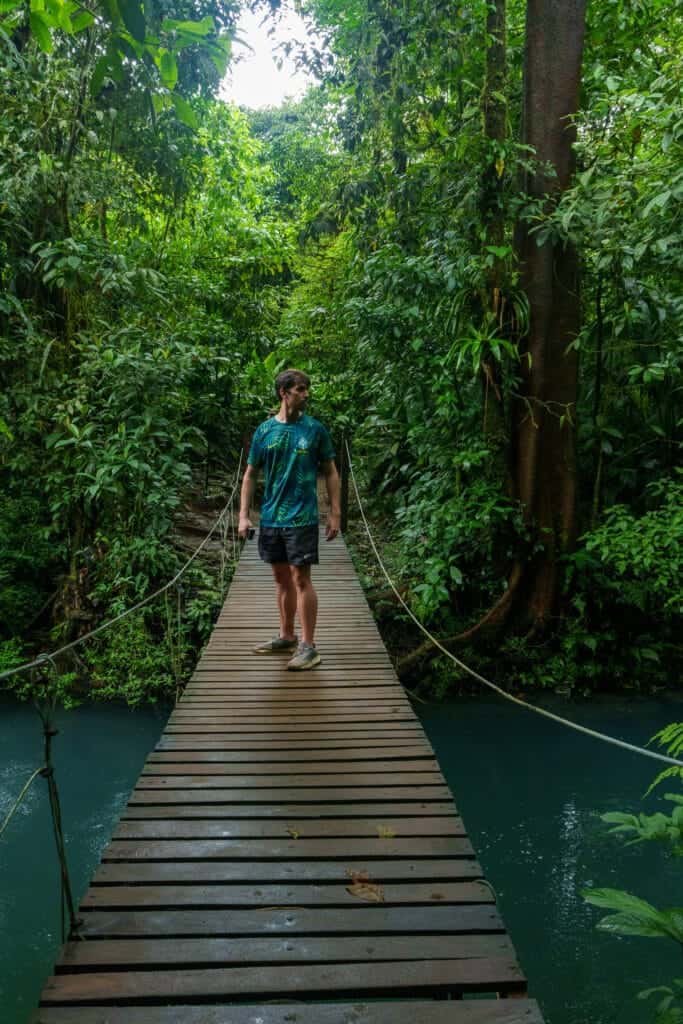 Myself ( Horizon Hugo) in the National Park of Rio Celeste on a wooden bridge.